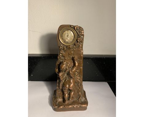 AN ARTS &amp; CRAFTS MANTLE CLOCK SIGNED 