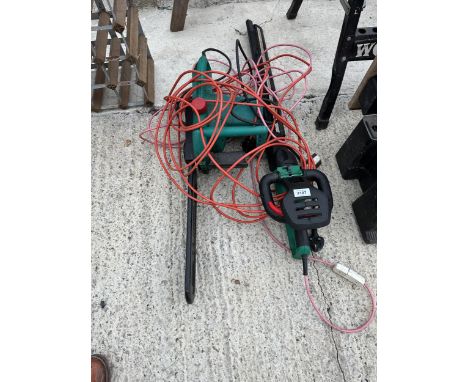AN ELECTRIC HEDGE TRIMMER AND A BOSCH ELECTRIC CHAINSAW 