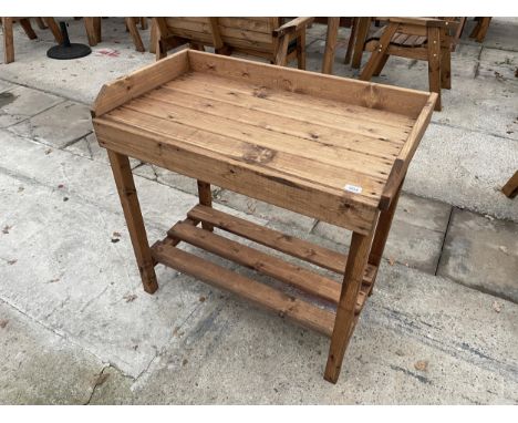 AN AS NEW EX DISPLAY CHARLES TAYLOR POTTING BENCH *PLEASE NOTE VAT TO BE ADDED TO THE HAMMER PRICE ON THIS ITEM* 