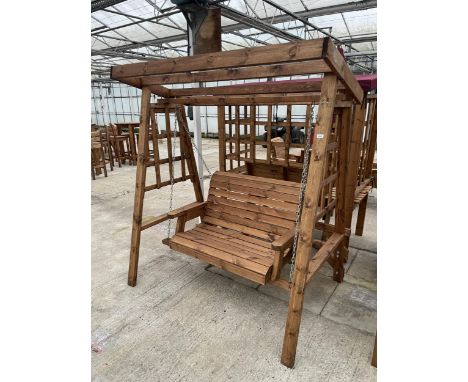 AN AS NEW EX DISPLAY CHARLES TAYLOR TWO SEATER SWING SEAT GARDEN ARBOUR *PLEASE NOTE VAT TO BE ADDED TO THE HAMMER PRICE ON T