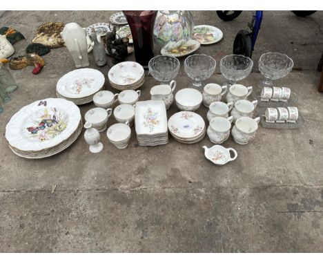 AN ASSORTMENT OF GLASS AND CERAMIC WARE TO INCLUDE CUPS, BOWLS AND PLATES ETC 