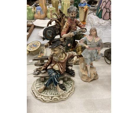 A CAPODIMONTE MODEL OF A MAN AND CAT PLAYING THE ACCORDIAN, CAPODIMONTE STYLE MAN ON A BENCH - A/F AND A CONTINENTAL FIGURE 