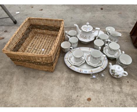 AN ASSORTMENT OF ITEMS TO INCLUDE A WICKER BASKET AND A TEA SERVICE ETC 