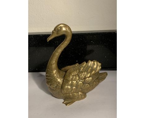 A GERMAN BRASS INKWELL GESCHUTZTN 1101 IN THE STYLE OF A SWAN 