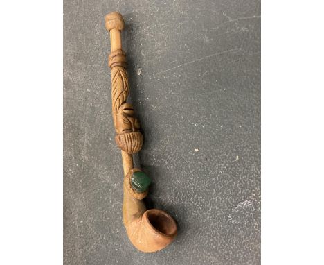 A VINTAGE HANDMADE TRIBAL WOODEN PIPE 