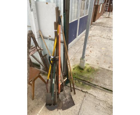 AN ASSORTMENT OF GARDEN TOOLS AND TWO SNOOKER CUES 