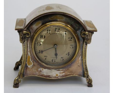 An early 20th century silver plate cased mantel timepiece, the case in the Neo Classical taste, having a French lever movemen