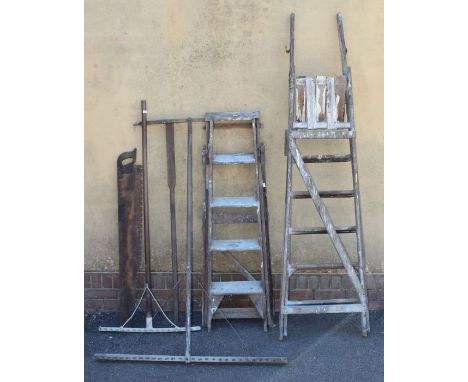 Two vintage ladders and a quantity of garden tools