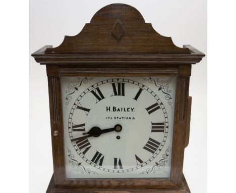 A Late Victorian Fusee Wall Clock, H.Bailey 175 Station street, Burton on 12" Square dial continued in an oak case, with sing