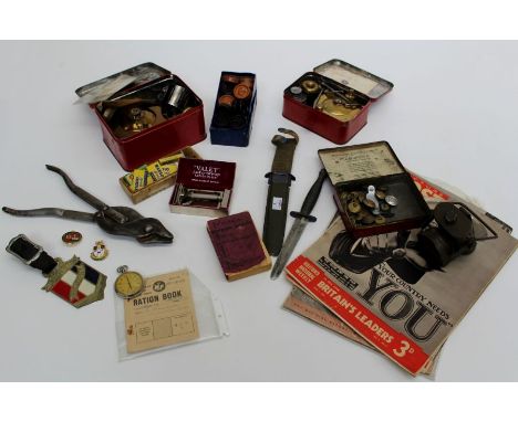 An interesting mixed collection of militaria. The collection includes military issue wire cutters, Lucas electric No 1 lamp w