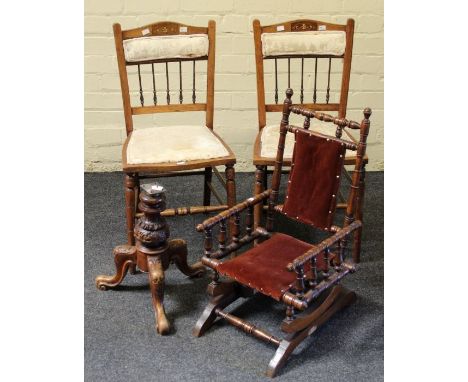 A pair of Edwardian beech bedroom chairs, each with spindle splats, a bobbin turned plush upholstered child's rocking chair a