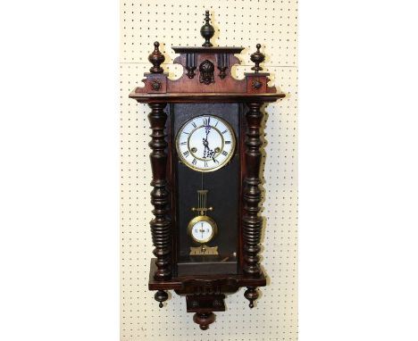 A late 19th century beech cased Vienna wall clock of small size with eight day gong striking movement. 65cm