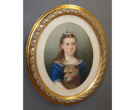 Late Victorian style school. An oval portrait of a young girl holding her terrier, pastel and mixed media, modern gilt frame,