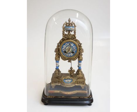 A good late 19th century French ormolu and porcelain mantel clock, circular 8cm porcelain dial with Roman numerals, twin wind