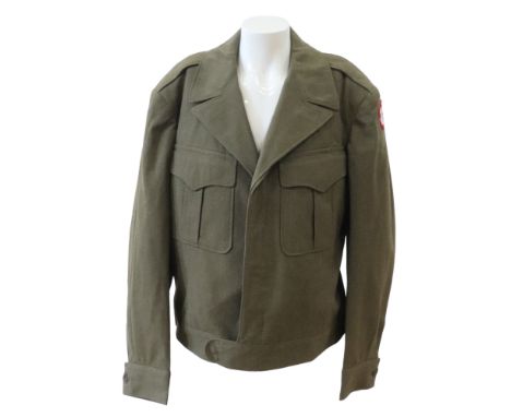 A Second World War US Army field jacket bearing an Army Service Forces patch