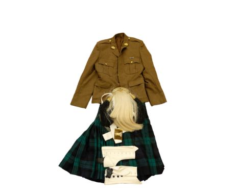 A post-War Scottish Highland regiment tunic, kilt, sporran and spats etc