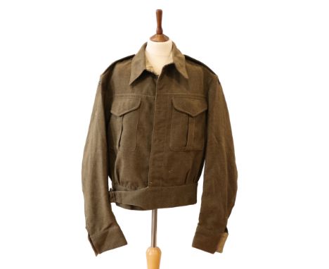 A 1943 New Zealand Battledress Blouse bearing insignia of an RASC officer