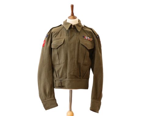 A 1942 Australian Battledress Blouse bearing RASC HQ Palestine &amp; Transjordan Command insignia