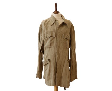 A Second World War army officer's Indian-made khaki cellular bush shirt