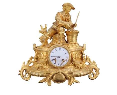 A late 19th / early 20th Century French ormolu mantle clock in the manner of Vincenti, adorned with a scene of a vintner crus