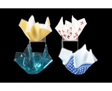 Four large glass handkerchief bowls, tallest 18 cm
