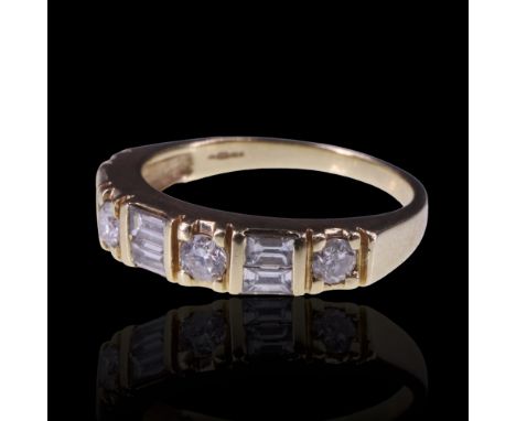 A diamond half hoop ring, set with bar-set pairs of baguette-cut diamonds divided by grain-set brilliants on a 14 ct gold sha