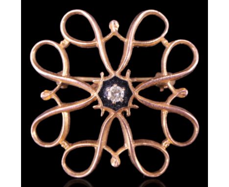A vintage 9 ct gold wire scroll openwork brooch centred by a small diamond brilliant claw-set over black enamel, 26 mm, 3.2 g
