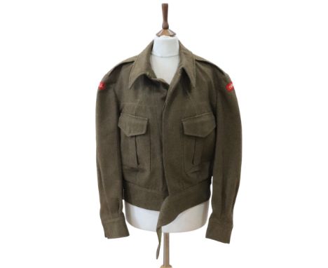 A Serge Battledress Blouse bearing Durham Light Infantry shoulder titles