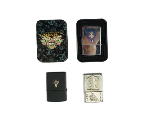 Two military Zippo flip-top lighters comprising a Bosnian Conflict Stabilisation Force (SFOR) and an HMS Sceptre commemorativ