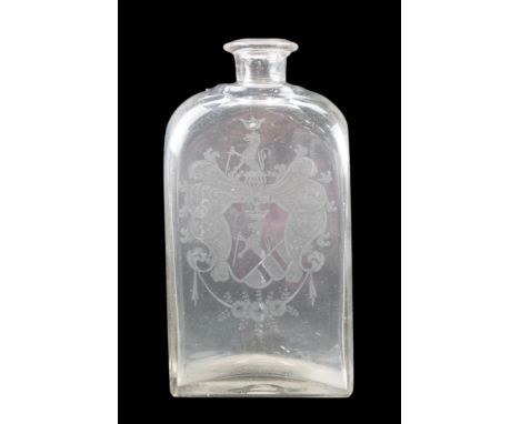 An early 19th Century free-blown glass decanter / flask, of shouldered form and rectangular section, bearing a wheel-cut in a