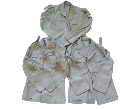 Three Second World War British army officers' khaki drill tunics