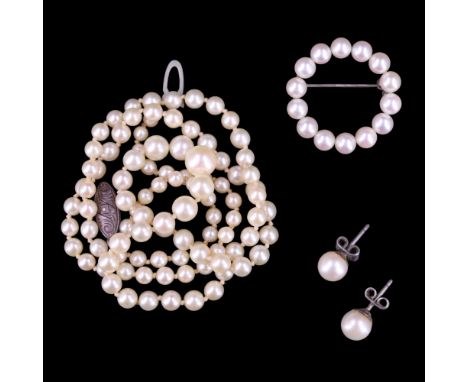 A vintage single-strand necklace of graded pearls, largest 7 mm, 52 cm; together with a pair of 7 mm stud earrings and an ann
