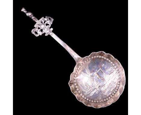 A 1920s Dutch silver caddy spoon, London import marks, 13 cm, 24 g