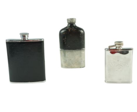 A Victorian hip flask together with a late 20th Century Jack Daniels and one other flask