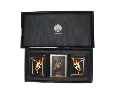 A Sobraine of London "The Art of Erté" playing cards set in a black and gilt lacquered box, box 28.5 x 14.5 x 6 cm