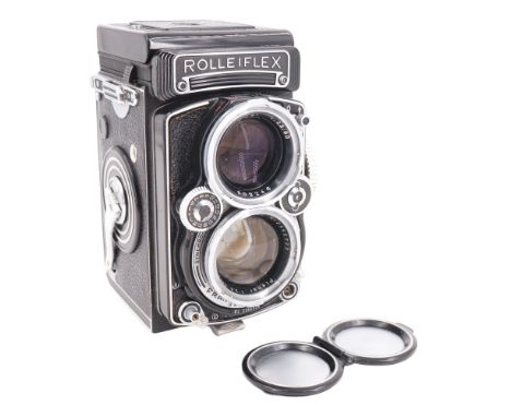 A Franke and Heidecke Rolleiflex 2.8 E2 twin lens reflex camera, having a Carl Zeiss Planar 1:2,8 f=80mm lens, serial E2 2354