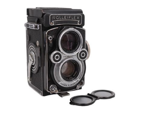 A Franke and Heidecke Rolleiflex 3.5F Model 4 twin lens reflex camera, having Carl Zeiss Planar 1:3,5 f=75mm lenses, serial 3