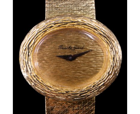 A 1970 lady's Bueche-Girod 18 ct gold dress watch, having a calibre 68 17-jewel manual wind movement and finely-bark-textured