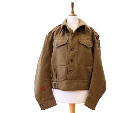 A 1940 Pattern Battledress Blouse, bearing the insignia of a Royal Artillery 6th Army Group major