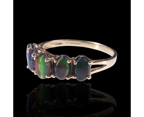 A five-stone ammolite ring, comprising five variously coloured cabochons claw-set between the bifurcated shoulders of a 14 ct