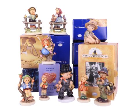A group of boxed Hummel figurines including 'Apple Tree Boy' and 'Pay Attention', together with Goebel and Kim Anderson figur