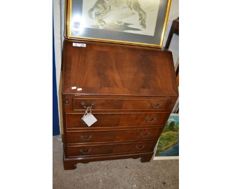 REPRODUCTION MAHOGANY BUREAU WITH FALL FRONT, FITTED INTERIOR OVER FOUR DRAWERS RAISED ON BRACKET FEET, 75CM WIDE