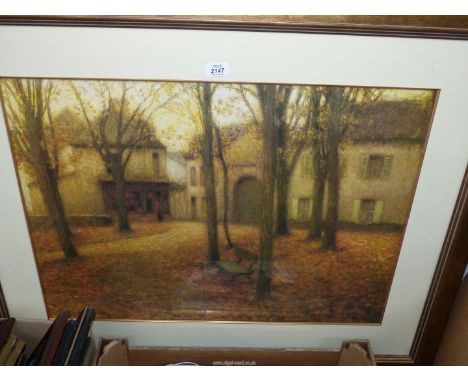 A large framed and mounted Print depicting a French chateau courtyard with trees and bench, no visible signature.