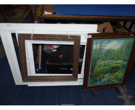 Three picture frames of various sizes and a Print of Parklands.