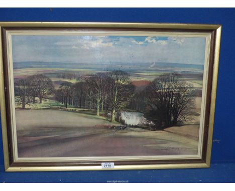 A framed Rowland Hilder Print on board depicting a rural landscape, 24 3/4'' x 17 1/2''.