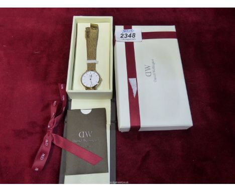 A ladies Daniel Wellington watch, Japanese movement and mesh strap, boxed with manual.