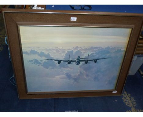 A large Coulson Print of a Lancaster Bomber, 37" x 29 1/4".