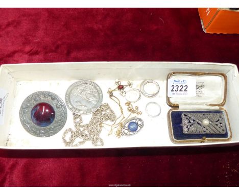 A small quantity of jewellery including a silver and Wedgwood Jasperware pendant, silver gilt chain and cross pendant featuri