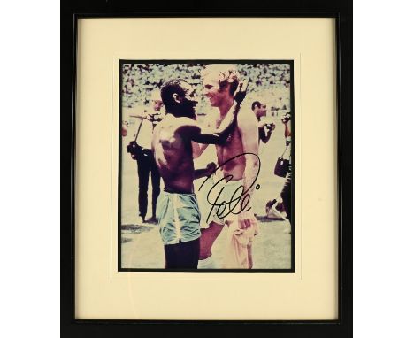 Pele Signed Photograph - Pele with Bobby Moore, Signed in black pen, framed and glazed, 36x41cm. 