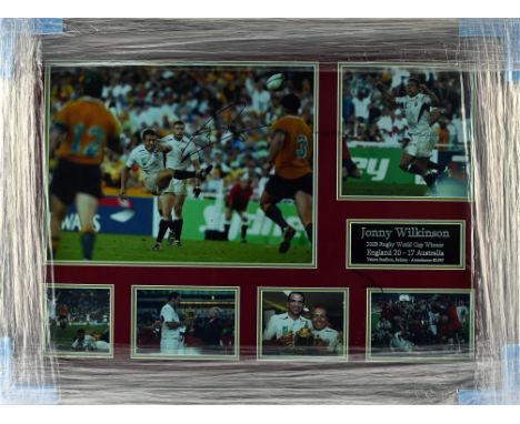 Jonny Wilkinson Signed framed display - Signed in black pen on main photo, 2003 Rugby World Cup Winner, with COA, Framed 77x5